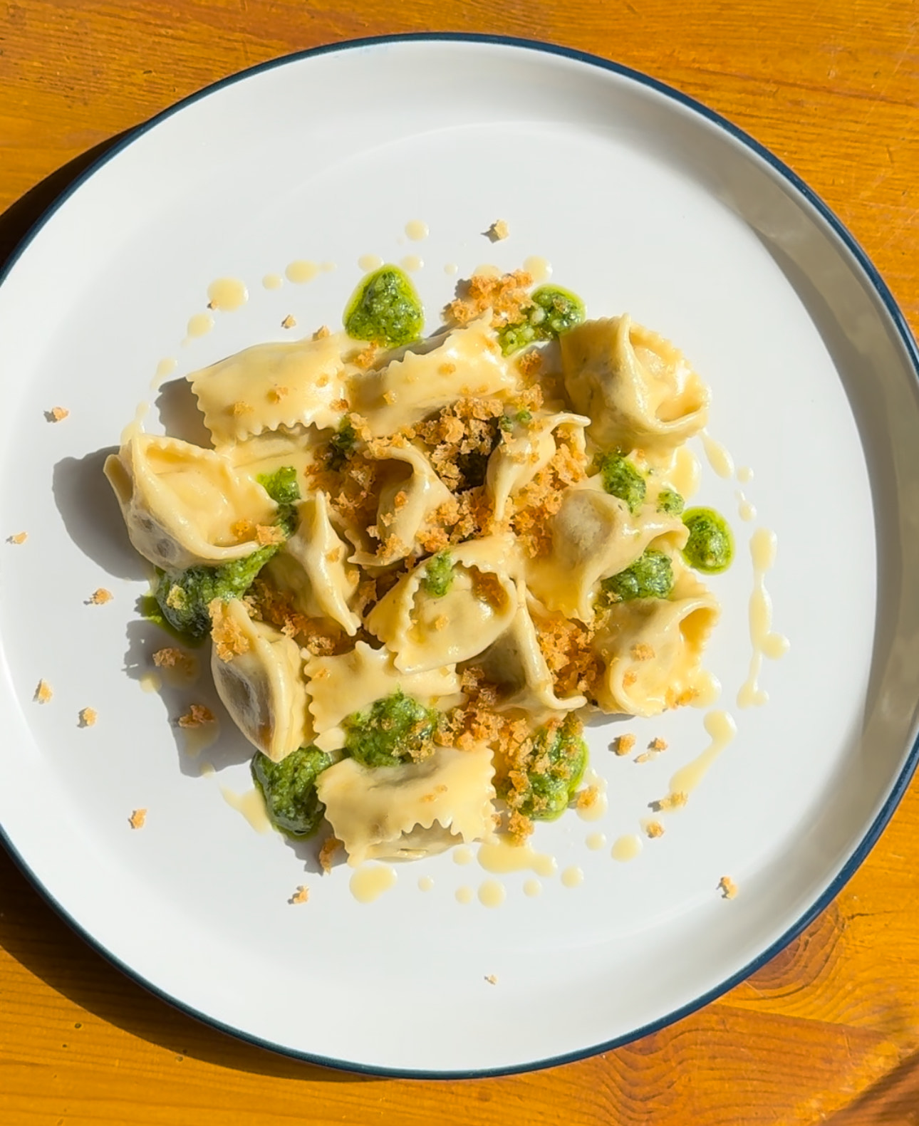 Mushroom ravioli, wild garlic pesto, crunchy sourdough crumb