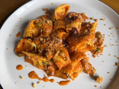 Ricotta and smoke scamorza ravioli, with creamy puttanesca sauce